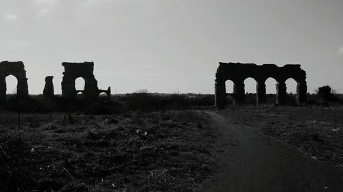 View of old ruin on landscape against the sky