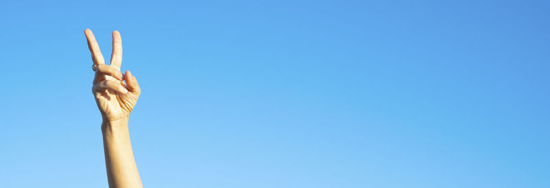 Low angle view of roof against clear blue sky