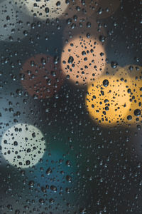 Full frame shot of wet glass window