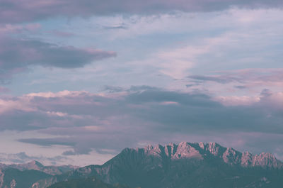 Low angle view of mountain against sky during sunset