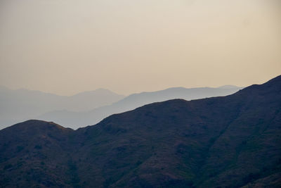 Scenic view of mountains against clear sky