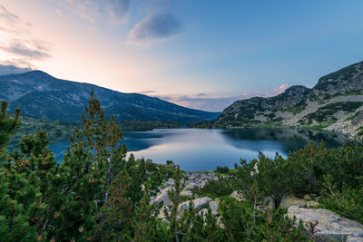 Popovo lake at bezbog, bulgaria and mountains reflection.