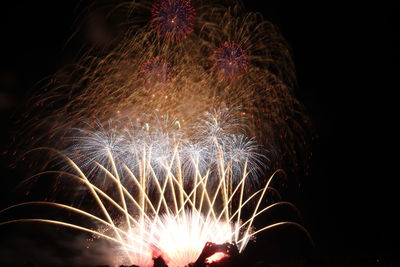 Firework display at night