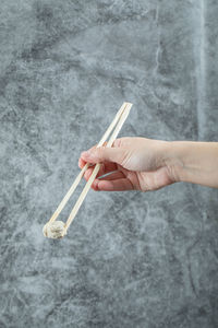 Close-up of woman hand holding umbrella