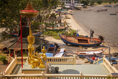 High angle view of boats moored at harbor