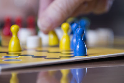 Close-up of human hand on table