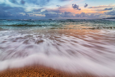 Scenic view of sea against sky during sunset