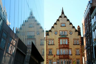 Low angle view of buildings against clear sky