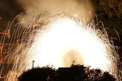 Firework display at night