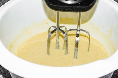 Close-up of electric mixer and bowl