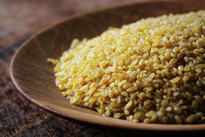 High angle view of rice in container on table