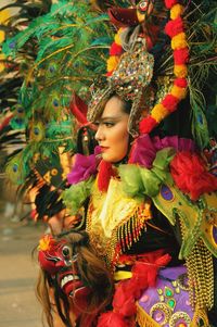 Portrait of woman wearing traditional clothing, ethnic carnival