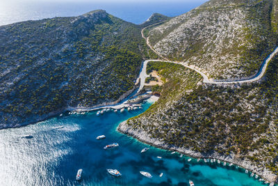 Aerial view of sea and mountain road