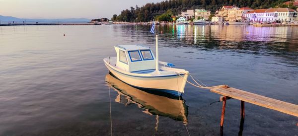 Boat moored on lake