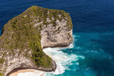 High angle view of rock formation in sea