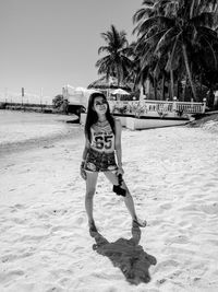 Full length of woman on beach