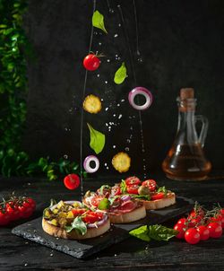 Ciabatta toasts on the table with levitation 