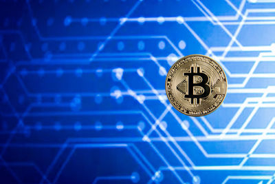 Close-up of information sign on blue wall