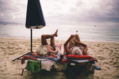 People sitting on beach