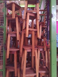 Stack of empty chairs at home