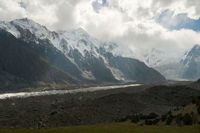 Scenic view of snowcapped mountains against sky