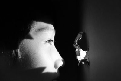 Portrait of young woman looking away