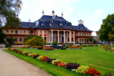 View of garden with buildings in background