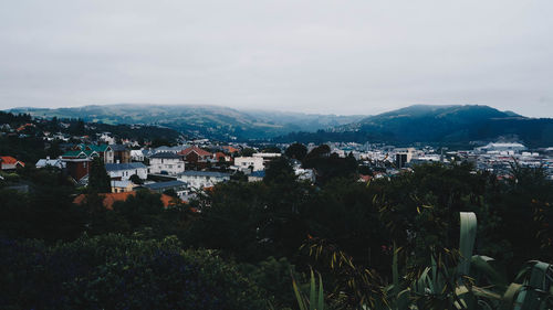 High angle view of buildings and houses in city 