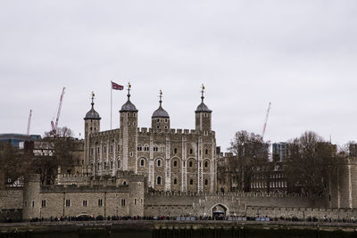 Buildings in city against sky