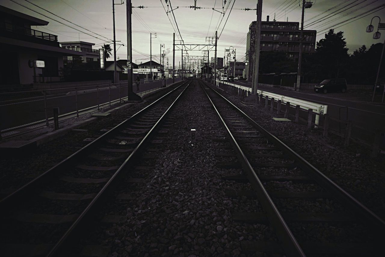 RAILROAD STATION AGAINST SKY