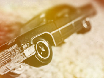 Close-up of guitar on table
