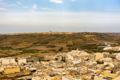 High angle shot of townscape against sky