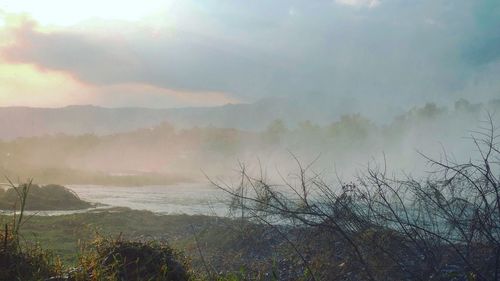 Scenic view of land against sky