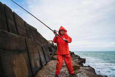 Senior man fishing in sea