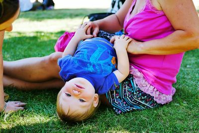 Low angle view of girl on field