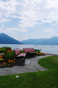 Scenic view of lake against cloudy sky