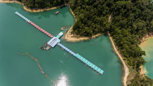 High angle view of beach houses on pier over lake