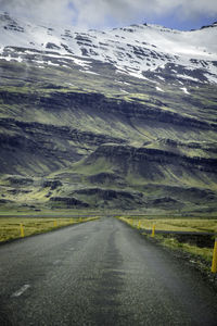 Road passing through field