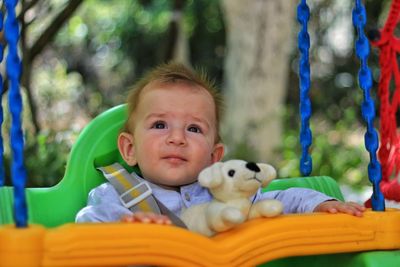 Portrait of cute baby toy