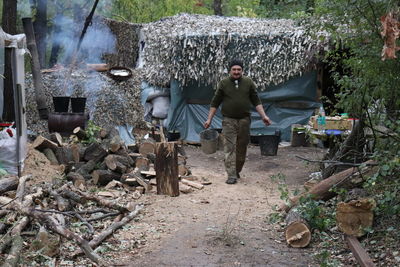 People working at shopping cart