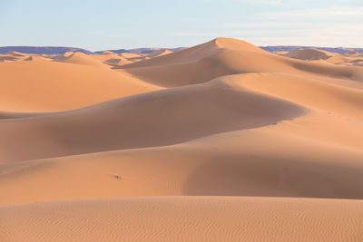 Scenic view of desert against sky