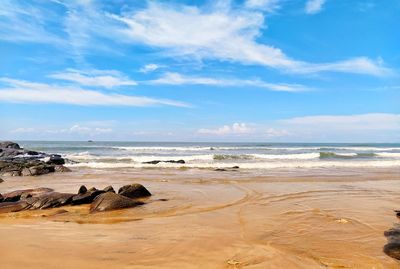 Scenic view of beach against sky