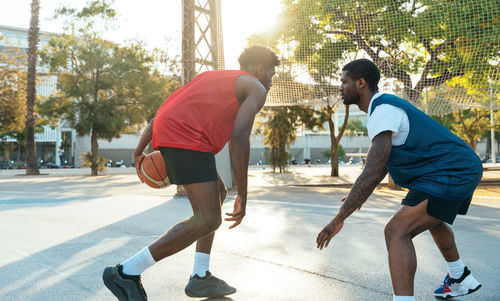 Side view of man exercising in gym