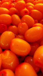 Full frame shot of oranges at market stall