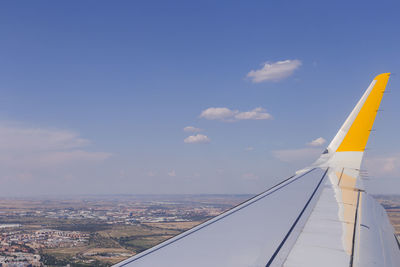 Aerial view of cityscape against sky