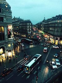 Traffic on city street at dusk