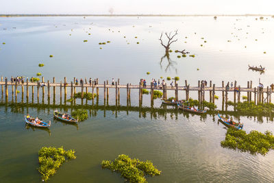 High angle view of people by lake