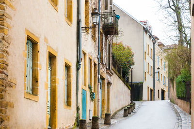 Alley amidst buildings in city