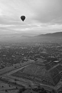 Aerial view of city against sky