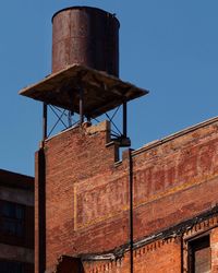 Low angle view of old building against clear sky